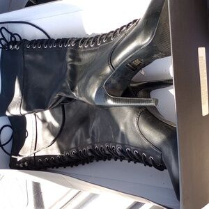 Black up the leg high heel boots